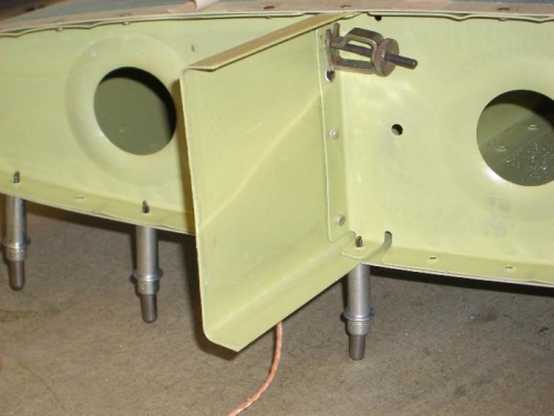 New rivet hole and clamped assy