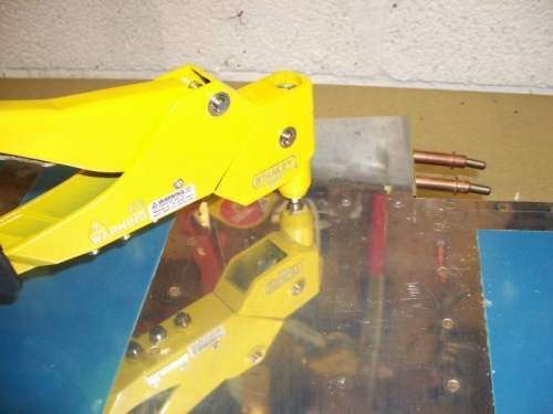 Blind riveting the trim tab attachment sub-spar