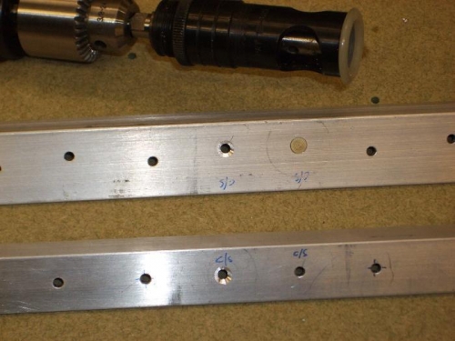 3 of the 4 holes countersunk, with rivet in one for depth.