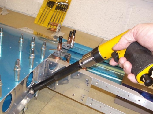 Angle drill attachment used for rib to spar holes