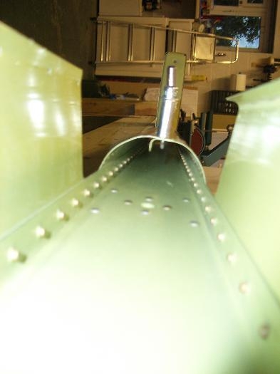 Unbent lower tabs, and rolled centre portion