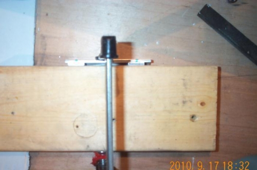 Angle, radius blocks and wood backing clamped