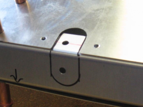 Cutting opening for trim servo rod