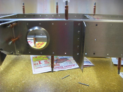 Riveted front attach brackets