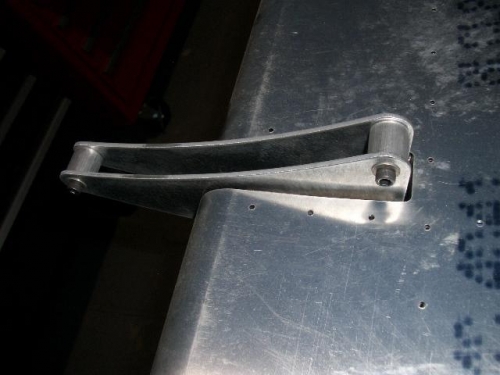 Spacer bushing for brackets