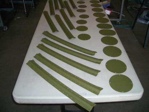 Primed hat sections and inspection covers