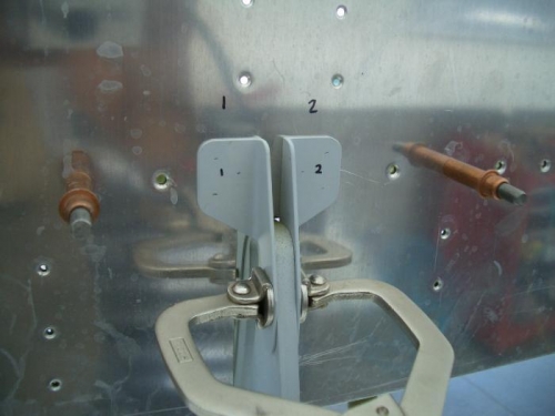 Locate and drill flap track stiffeners