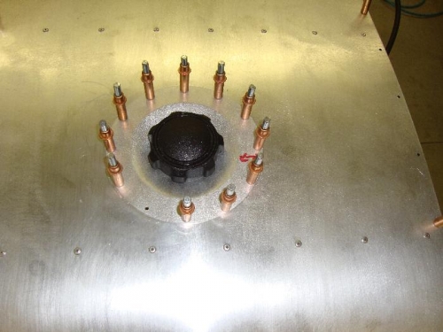 cut & install fuel neck scupper.