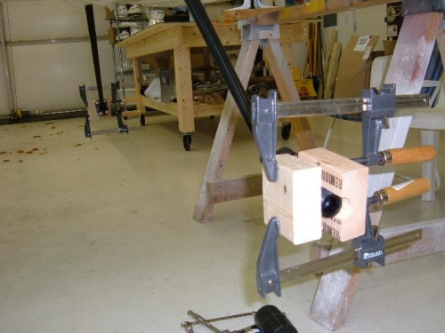 Blocks clamped to axles