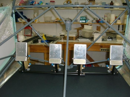 Rudder pedals attached to floorboard