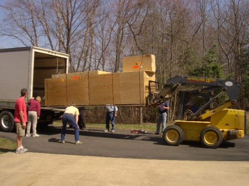 Unloading first crate
