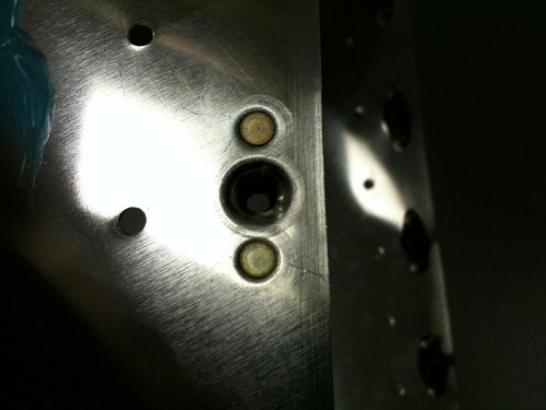 closeup of nutplate riveting