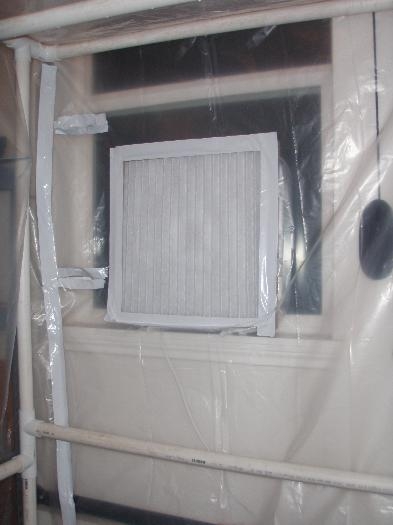 Sealed booth with window vent