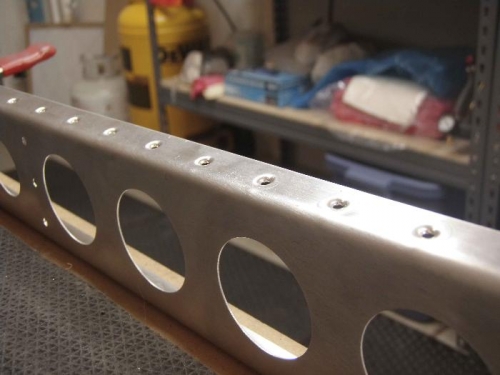 Small bumps in spar due to dimple die