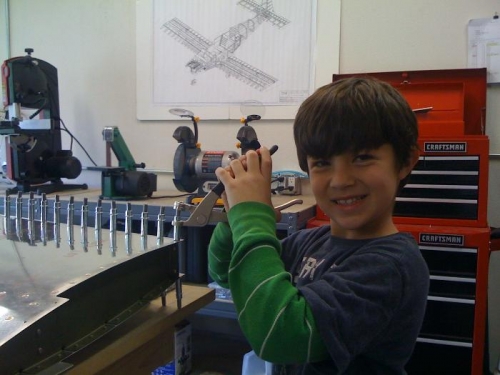 Noah Barkan helps build the vertical stabilizer!