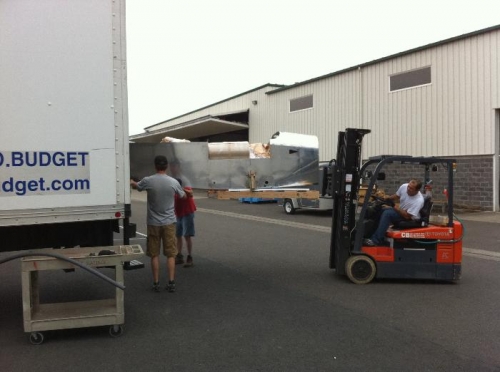 The fuselage being loaded