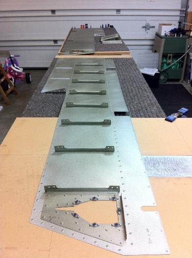 Rib halves riveted to skins