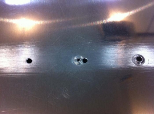 Incorrect alignment of the male dimple die!