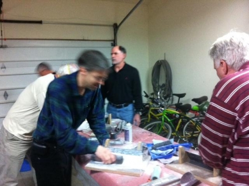 Shannon sanding the fiberglass