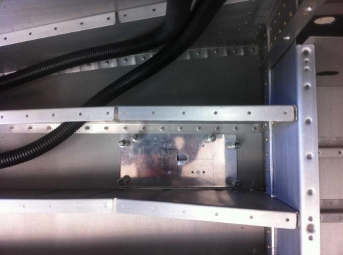 Antenna doubler under left passenger seat