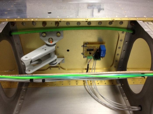 Aileron bellcrank and pitot heat controller