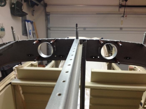 Holes in bulkhead for ventilation into overhead console