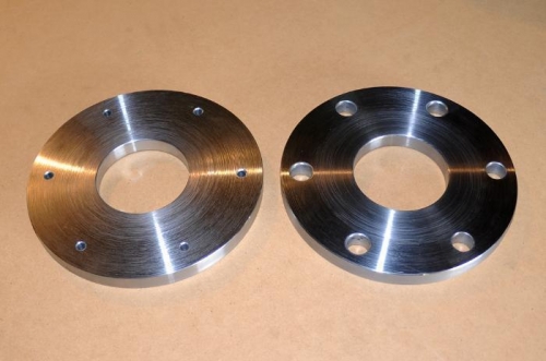 Faced in lathe and drilled initial holes