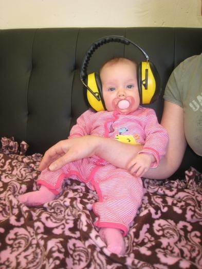 Amelia, waiting for her turn. It didn't take her long to get used to the earmuffs.