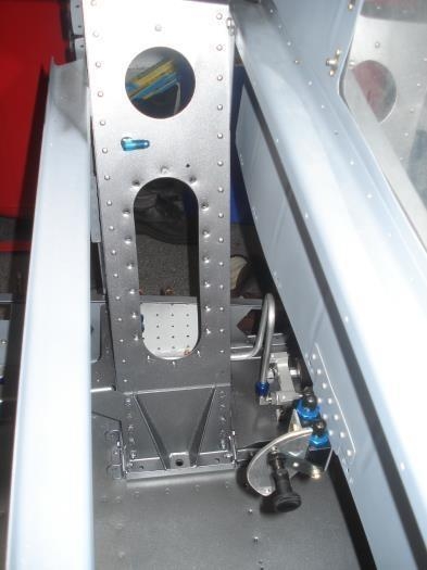 Left gear tower with a fitting for the brake line