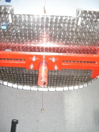 Plumb bob in the centre line off the firewall