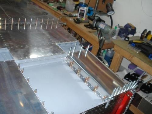 Bead of sealant and forward skins clecoed.