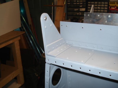 Outboard hinge bracket installed.