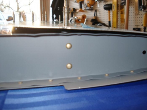HS 706 riveted to the front spar