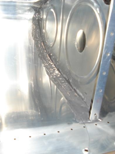 Rivet head side of the rib