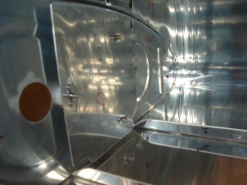 Plates formed to clear stiffeners