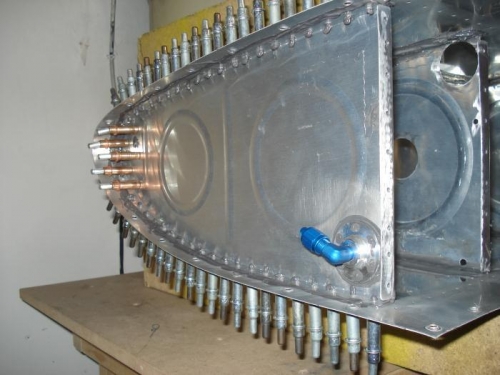 Outboard rib is sealed and 100% clecoed in place along with the T-410