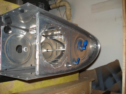 Inboard rib riveted in place