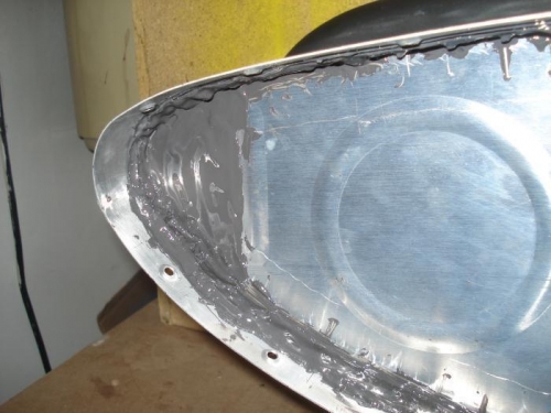 Outboard rib and T-410 riveted and sealed in place