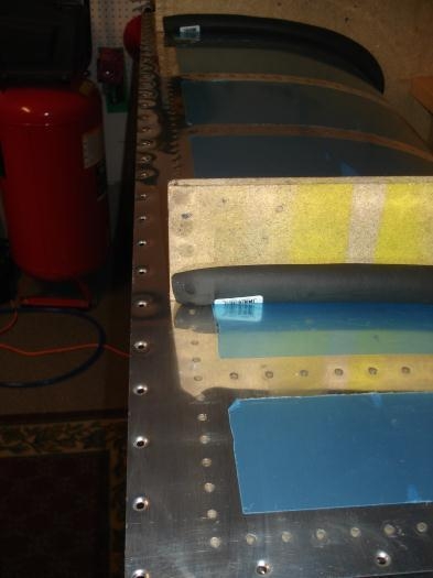 Baffle riveted in place.