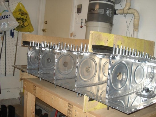 Ribs sealed and 100% clecoed.