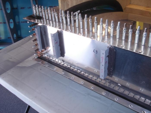 Waiting to set the skin rivets.