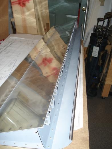 Bottom of the spar and hinge riveted in place