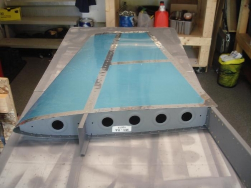 Skin riveted to spar