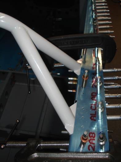 Clamps and front and back of seat back support