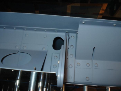 Inner right wing aileron hinge bracket in place