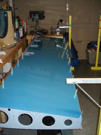 Right wing bottom skins clecoed on.