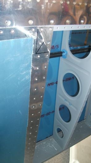 Inboard skin dimpled and scarfed.