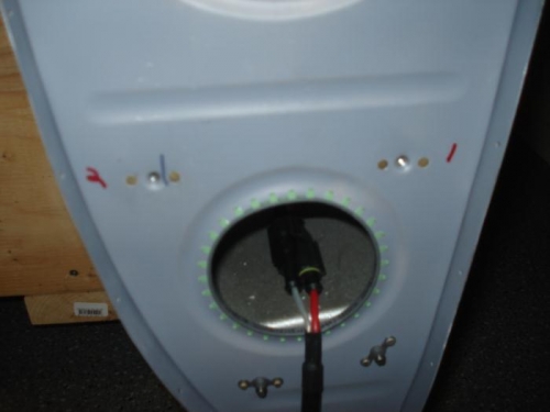 Nutplates drilled and riveted in place for the bracket