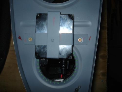 #8 flush screws holding the bracket and capacitor in place.