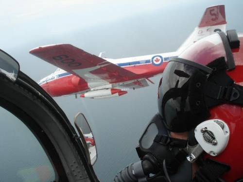 Nice form work...nice visor reflection shot too with the team lead Major Chirs Hope!